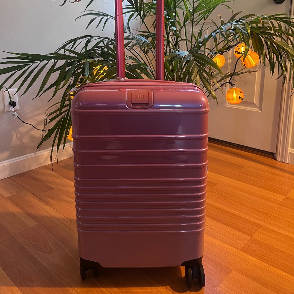 Beis carry on roller from the Wicked collection glossy pink color brand new
